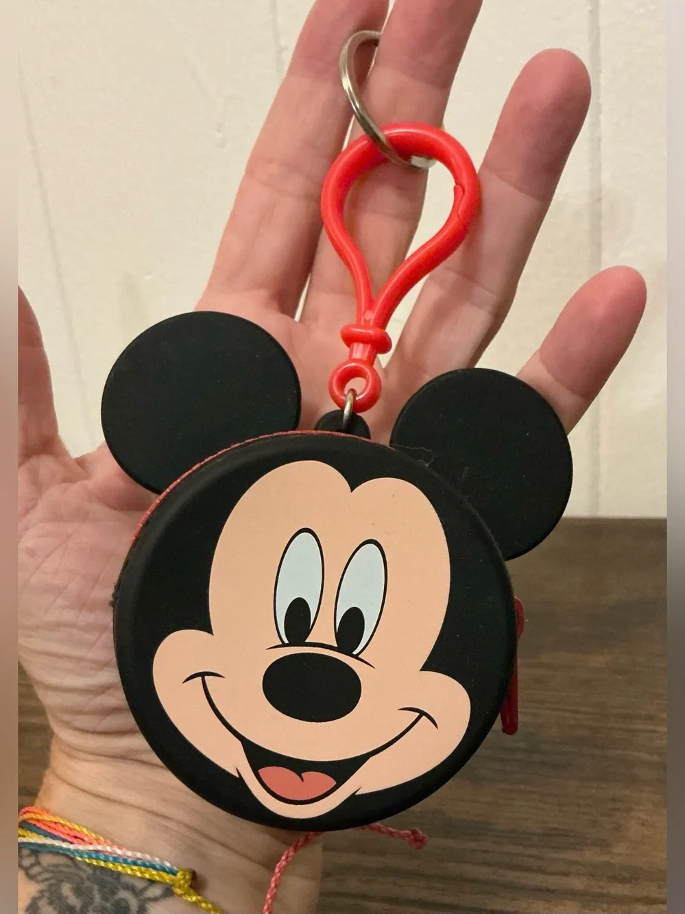 A rare Disney Parks Mickey Mouse silicon coin purse keychain